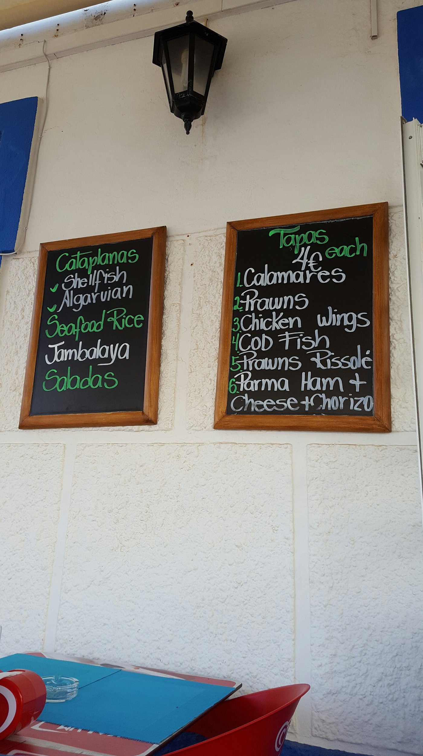 Chalkboard menus on the white wall